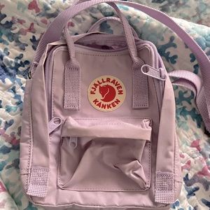 Authentic Kanken cross-body. Great condition. 1 smudge on front pouch.